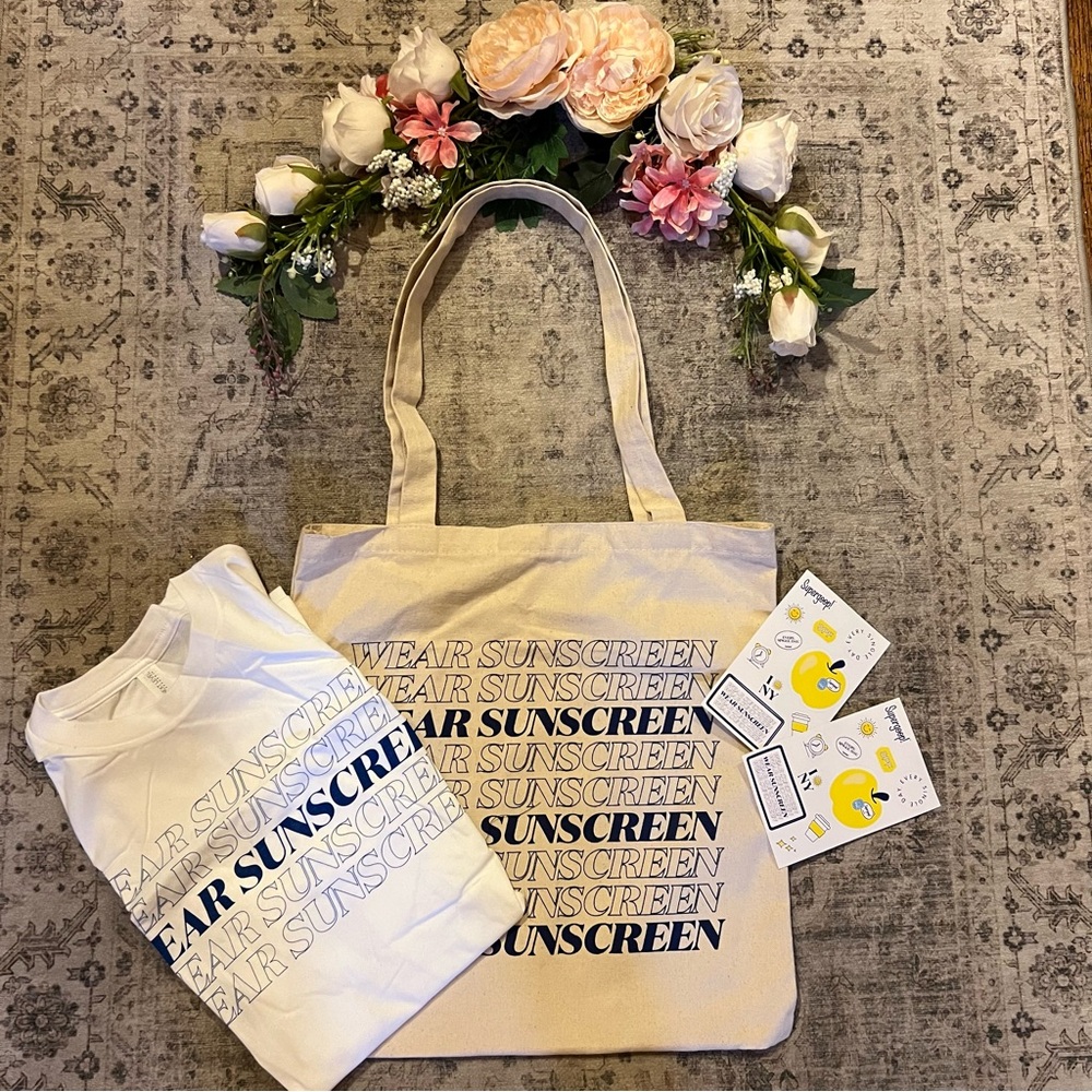 New! Supergoop Wear Sunscreen Tote, Tee, and Stickers
